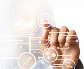 96140 A person's hand interacting with a transparent digital interface, featuring technological icons like a laptop, growth chart, and network connections. The image symbolizes innovation, connectivity, and interaction with modern technology.